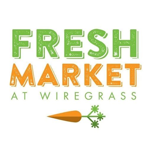 Fresh Market at Wiregrass logo with carrot underneath text